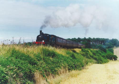 The North Norfolk Railway steaming through the countryside